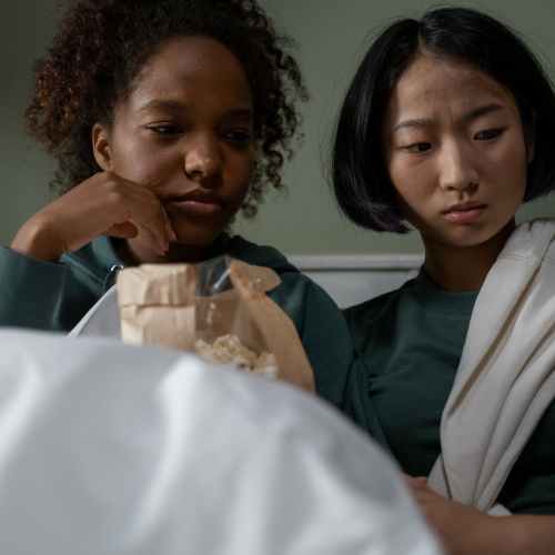 two women watching movie