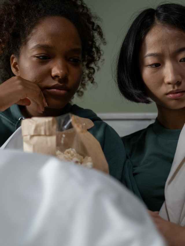 two women watching movie